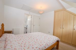 Bedroom One- click for photo gallery